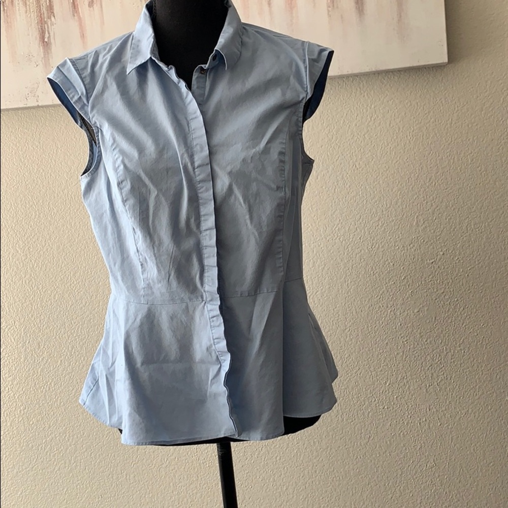 Vince Camuto peplum top. Size M. Hidden buttons.